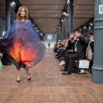 A model dons a volcano print dress for Marcel Ostertag at Berlin Fashion Week. Lucky for her, the event was indoors and there was no risk of her taking flight. Photo: DPA