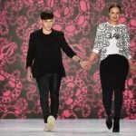 Fashion designer Jesko Wilke and model Maria Poweleit (on the right) take one last walk on the runway for Glaw's Berlin show. Photo: DPA