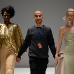 Isreali designer Zion Avana bested his colleague Jesko Wilke by walking down the runway with two models. Photo: DPA