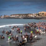 Horse riders gather on Enramada beach along the southern Adeje coastline on the Canary island of Tenerife, on January 20th, to celebrate the festival of Saint Sebastian, patron protector of animals against pests and disease. Photo: Desiree Martin/AFP