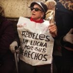 "Grandparents fighting for their rights!" - an older Podemos supporter having a rest among the busy scenes in central Madrid. Photo: Jessica Jones 