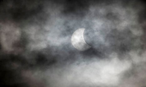Denmark's solar eclipse lost in the clouds