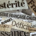 French government hails cut in public deficit