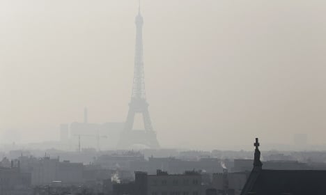 Eiffel Tower cloaked in smog as pollution spikes