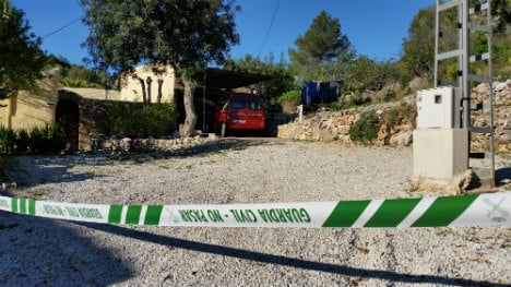 Town in shock at expat double murder