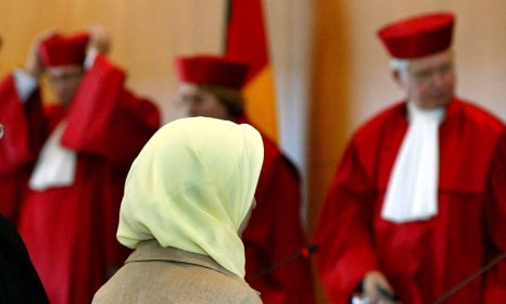 Court orders Islamic veil ban softened