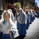 All the family get involved in the Easter processions. Here, girls hold palm leaves blessed during the morning Mass at the Cathedral of San Cristobal de La Laguna during a procession commemorating the arrival of Jesus in Jerusalem, in Tenerife.Photo: Desiree Martin 