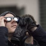 People took to the streets in Stockholm to catch a glimpse of the solar eclipsePhoto: TT