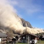 Spectacular rockslide creates huge dust cloud