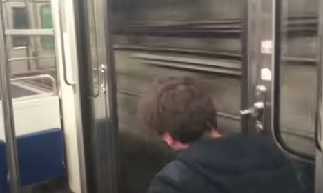 Metro whizzes through Paris with doors open