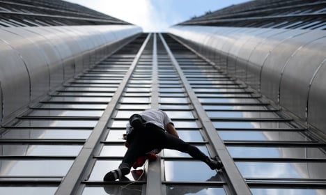 French spiderman scales Paris tower for Nepal