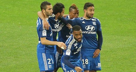 Lyon peg back PSG in Ligue 1 title fight