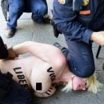 Femen protestor corners Spain’s interior minister