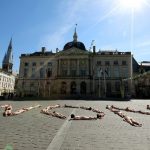 More than thirty artists and technicians hit the ground in front of Chalons-en-Champagne city hall, eastern France in June, forming the word "No" to protest against the status reform of the "intermittents du spectacle" by the French government, during the "Furies" circus and street festival. They, too, were naked.Photo: AFP