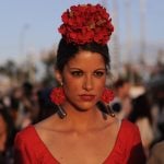 A woman wears the traditional flamenco-style costume for the April Fair.Photo: Cristina Quicler / AFP.
