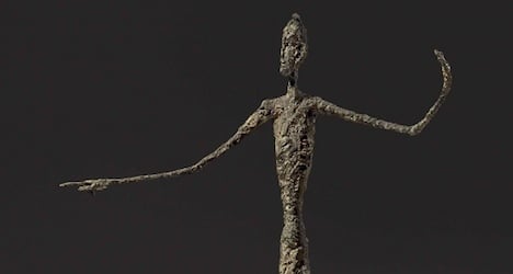 Giacometti sculpture sets new auction record