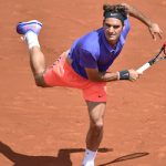 Federer and Wawrinka advance in French Open