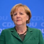 Cracks in Merkel coalition after spy claims