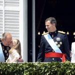 Princess Leonor gives her grandfather, the former monarch, a kiss on the day of her father's coronation as king. Juan Carlos abdicated in 2014, making way for his son to take the Spanish crown. Princess Leonor gained the title Princess of Asturias and became second in line to the Spanish throne. Photo: Gerard Julien/AFP