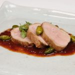 <b>Sant Pau.</b> This seaside restaurant in Sant Pol de Mar, Catalonia took 20th place. It features the "contemporary Catalan cooking" of chef Carme Ruscalleda. Pictured here is one of her creations of roast pork in a <i>salsa piquillo</i> wine sauce with pistachios.Photo: <a href="http://bit.ly/1EmEruk">Alcorta vino</a> / Flickr Creative Commons.