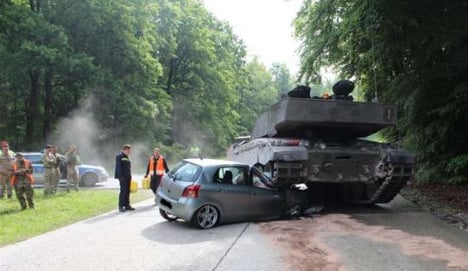 British army tank crushes learner’s car