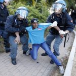 Police clear migrants at Franco-Italian border