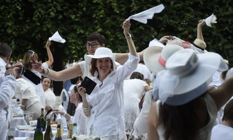 Paris turns out in white for annual chic picnic