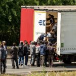 Migrants disrupt Channel Tunnel traffic in Calais