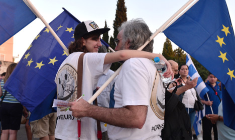 France salutes Greece but Germans sceptical