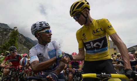 Froome defies abuse to win Tour de France
