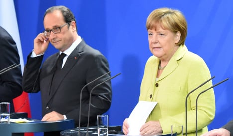 Hollande meets Merkel to seek way out of crisis
