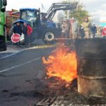French farmers block German, Spanish trucks
