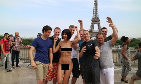 Artist arrested for naked Eiffel Tower selfies