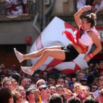 A woman is tossed in the air during the opening ceremony of the San Fermin bullfighting fest  in Pamplona.Photo: Cesar Manso / AFP