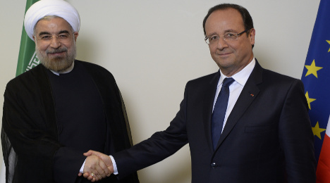 Hollande invites Iranian president to visit Paris