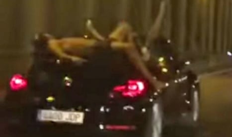 Tourist lies on speeding car in latest stupid stunt
