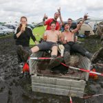 Mud and rain isn't stopping these metal fans from enjoying the start of the 25th annual Wacken Open Air festival in northern Germany.Photo: DPA