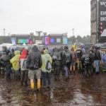 As the crowds arrived at the festival, some metal fans were already up to their ankles in mud after unusually heavy storms.Photo: Photo: DPA