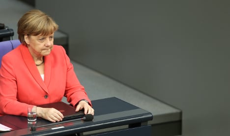 German kids mock Merkel with fave word
