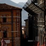 Renzi vows L’Aquila will be rebuilt amid protests
