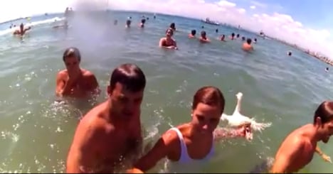 Animal rights activist beaten with live duck at festival in Catalonia
