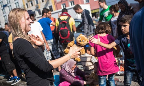 Munich police swamped with refugee donations