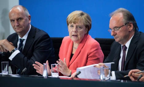 Merkel agrees €2 billion extra in refugee aid