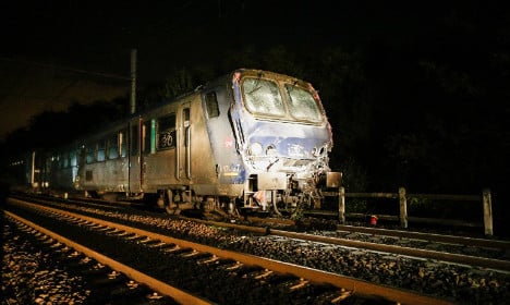 Fifteen hurt as train hits truck in western France