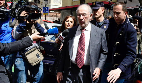 Judge withdraws passport of ex-IMF chief Rato in corruption case