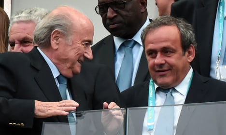 Frenchman Platini hit with suspension by Fifa