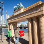 Perhaps struggling to find its own connection to the past, the finance power house imported a bit of Berlin, as they got their own miniature Brandenburg Gate for the day.Photo: DPA