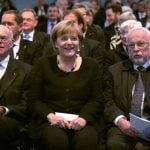 Chancellor Angela Merkel was having a great time at the event in Frankfurt, flanked by Speaker of the Bundestag Norbert Lammert, and Lothar de Maiziere, the last leader of East Germany. Photo: DPA