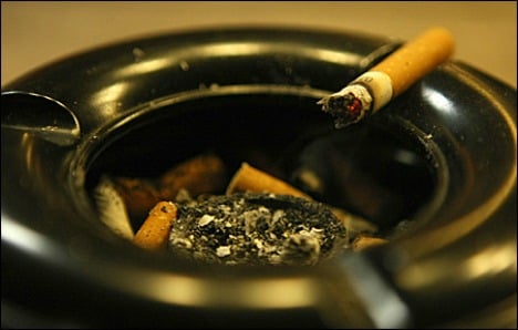 Policeman compensated in passive smoking case