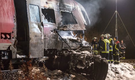 Two dead as train hits US military transport truck
